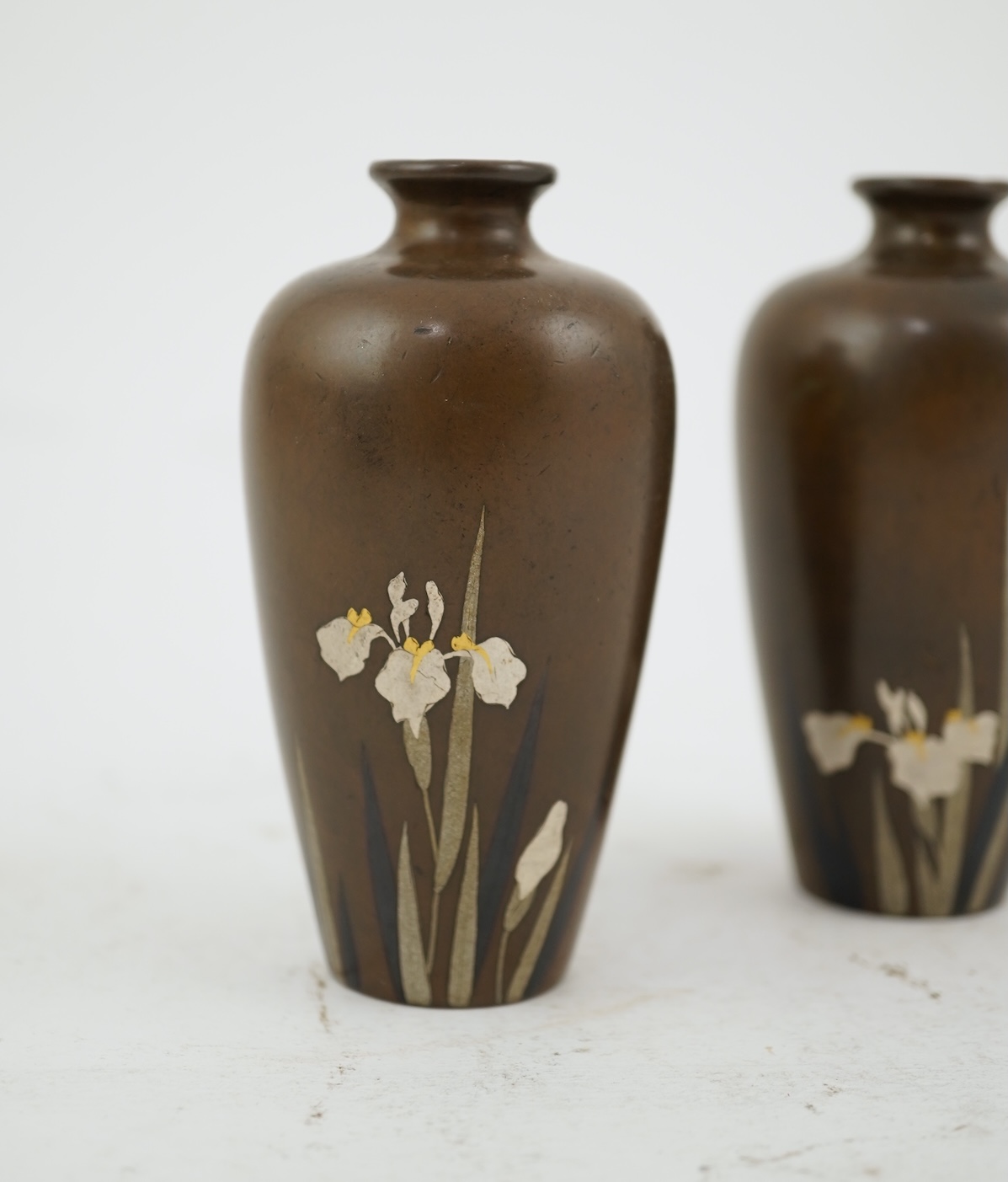 A pair of Japanese bronze and mixed metal miniature vases, by Noboru Nogawa, Meiji period